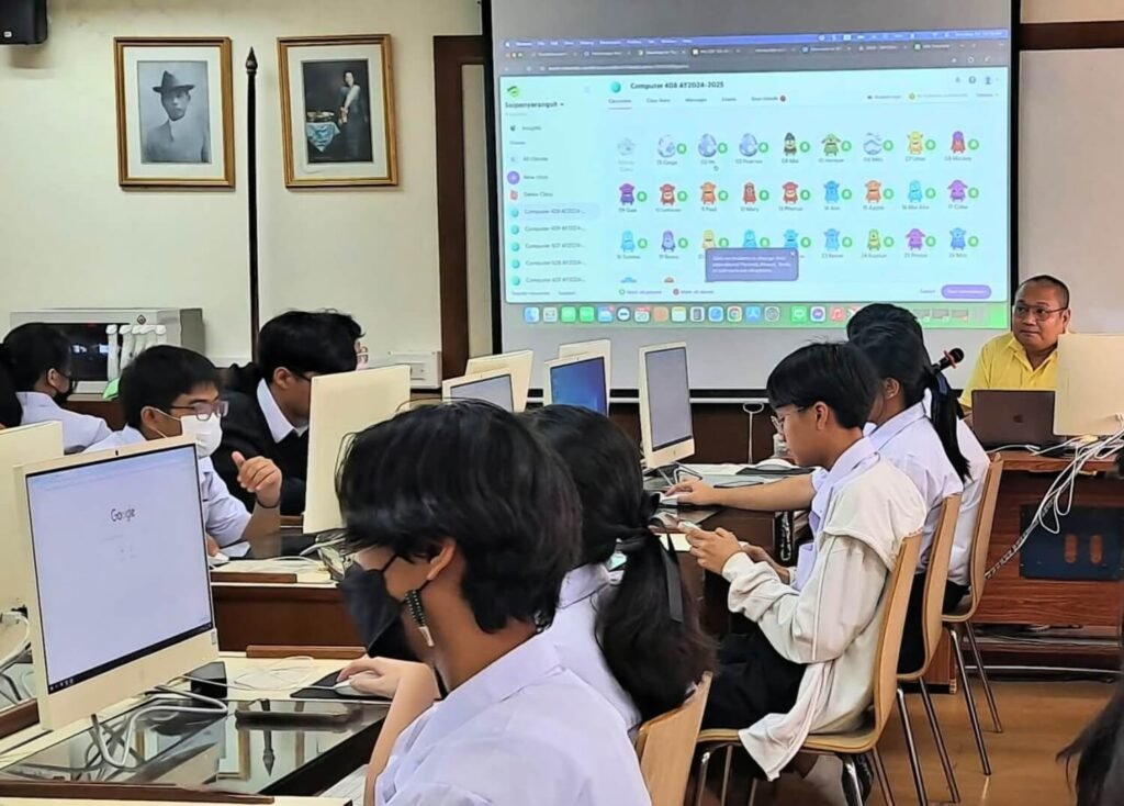 SPR BFITS Program students learning computer skills with Teacher Aldwin Malabanan