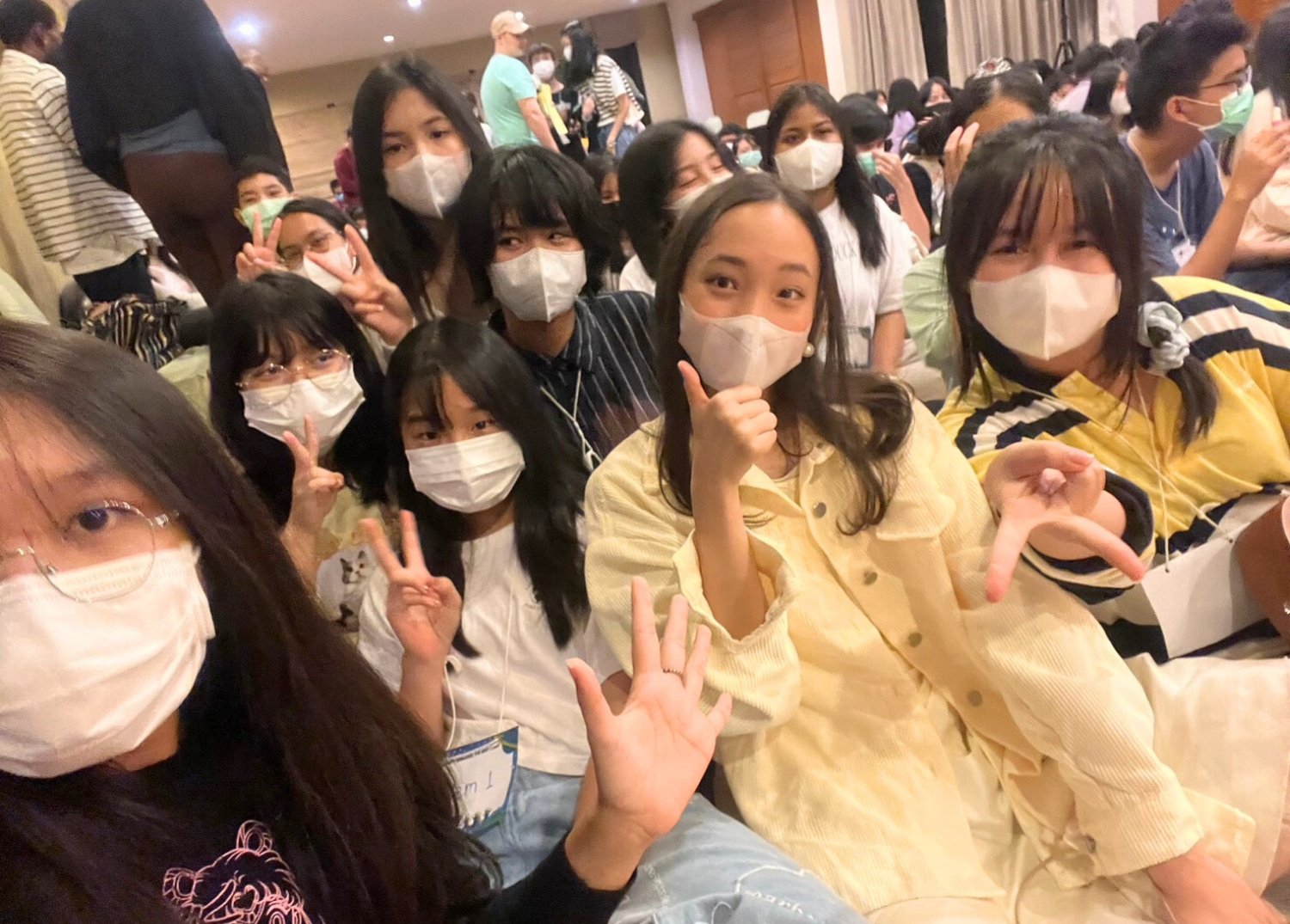 Thanathansorn Chitlaoarporn (Neptune) and her classmates taking a photo during the BFITS Program camp orientation